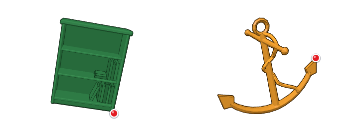 Two 3D objects, a bookcase and an anchor, each marked with a red dot